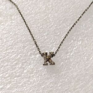 Vera Wang floating mini initial letter K necklace.